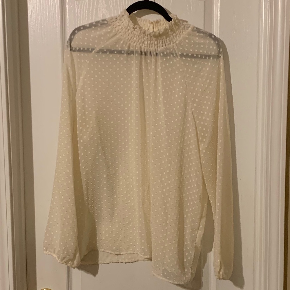 Polkadot style sheer off white top